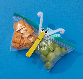 Ziploc Easy Open Tabs bag, snacks, clothespin, grapes, cheese snacks, googly eyes, pipe cleaners, blue, yellow, green.